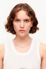 ⁦كو Bimba Y Lola عقد قلب قصير مرصع باللؤلؤ ذهبي 24BTV4788 مُكَمِّلات⁩ - الصورة ⁦2⁩